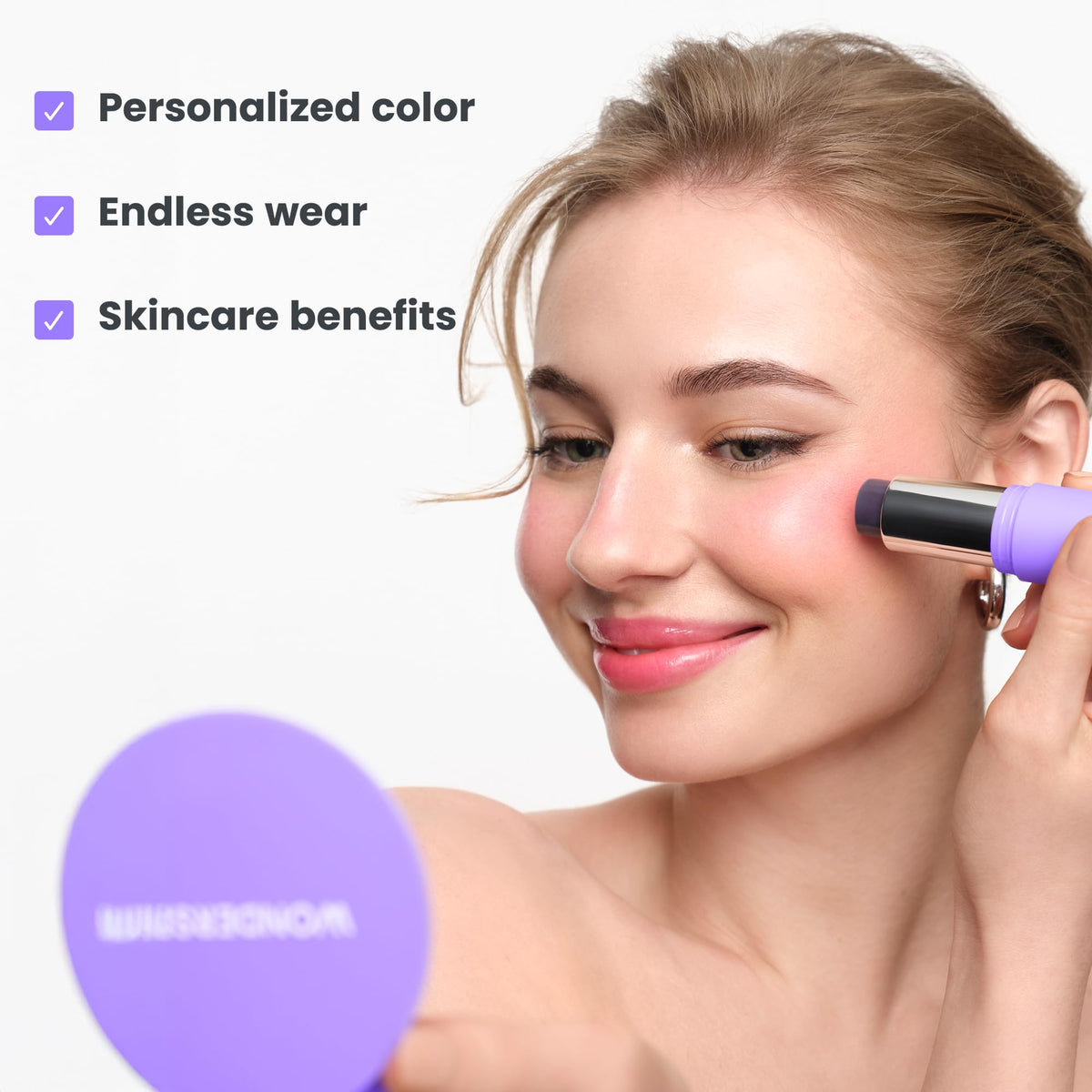 Wonderskin pH-Activated Cream Blush Stick applied on cheeks