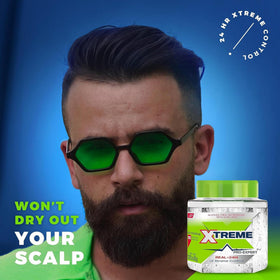 Xtreme Pro-Expert Styling Gel on a vanity with hair tools