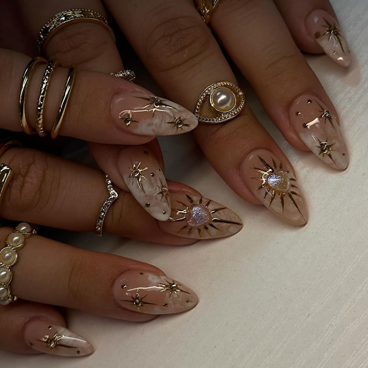 XZMeiLun 3D Boho Stars Gold Press On Nails Kit front view with 24 almond nails