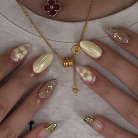 XZMeiLun Yellow Chrome Flower Press On Nails front view