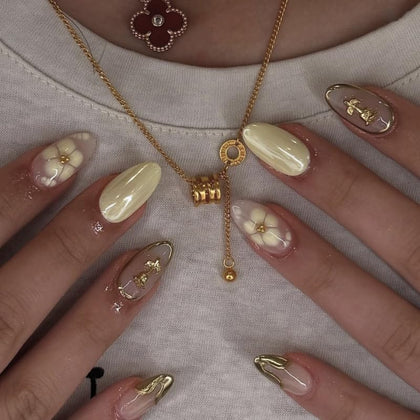 XZMeiLun Yellow Chrome Flower Press On Nails front view
