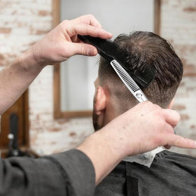 YASAKA thinning scissors in use on hair