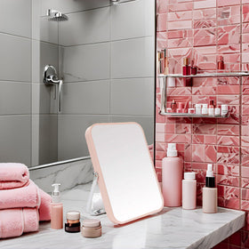 YEAKE portable folding mirror displayed on a bathroom countertop