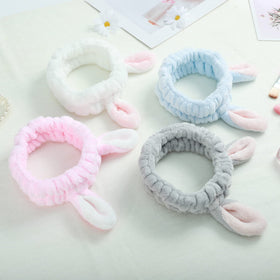 Ygreato Bunny Ears Headband in blue worn by a model
