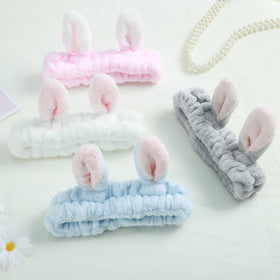 Ygreato Bunny Ears Headband in use during makeup application