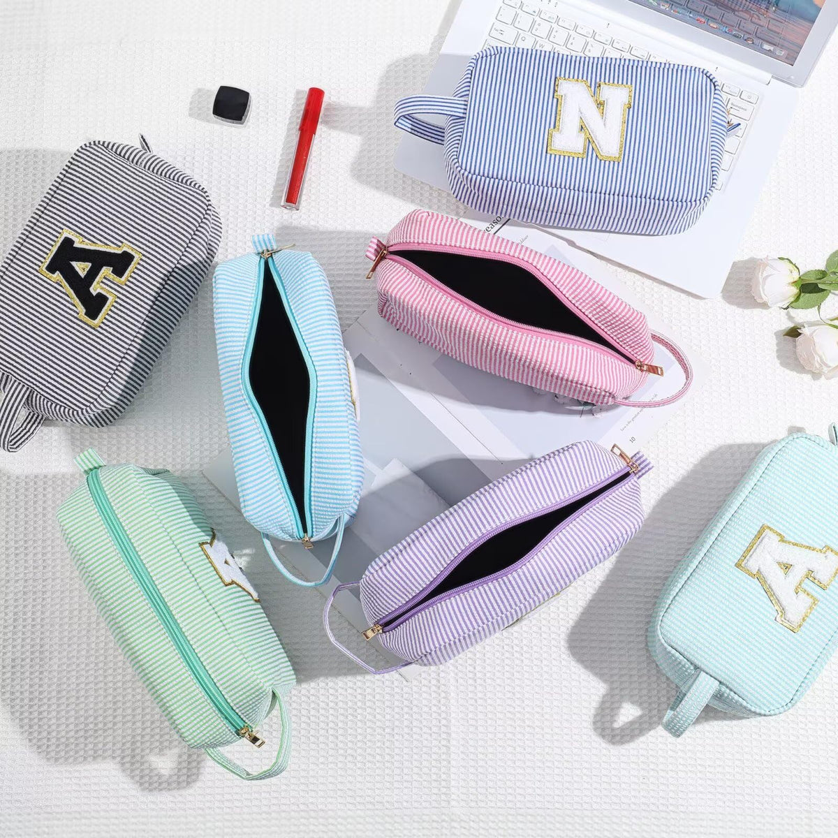 YOOLIFE Initial Makeup Bag displayed with beauty accessories