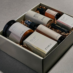 ZAAINA Spa Gift Basket contents displayed on a table