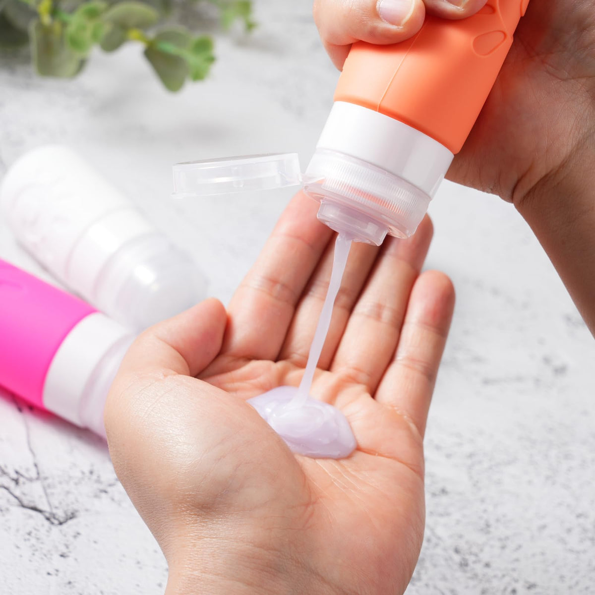 Zafit travel bottles set displayed with toiletries