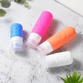 Zafit travel jars and spray bottles arranged neatly